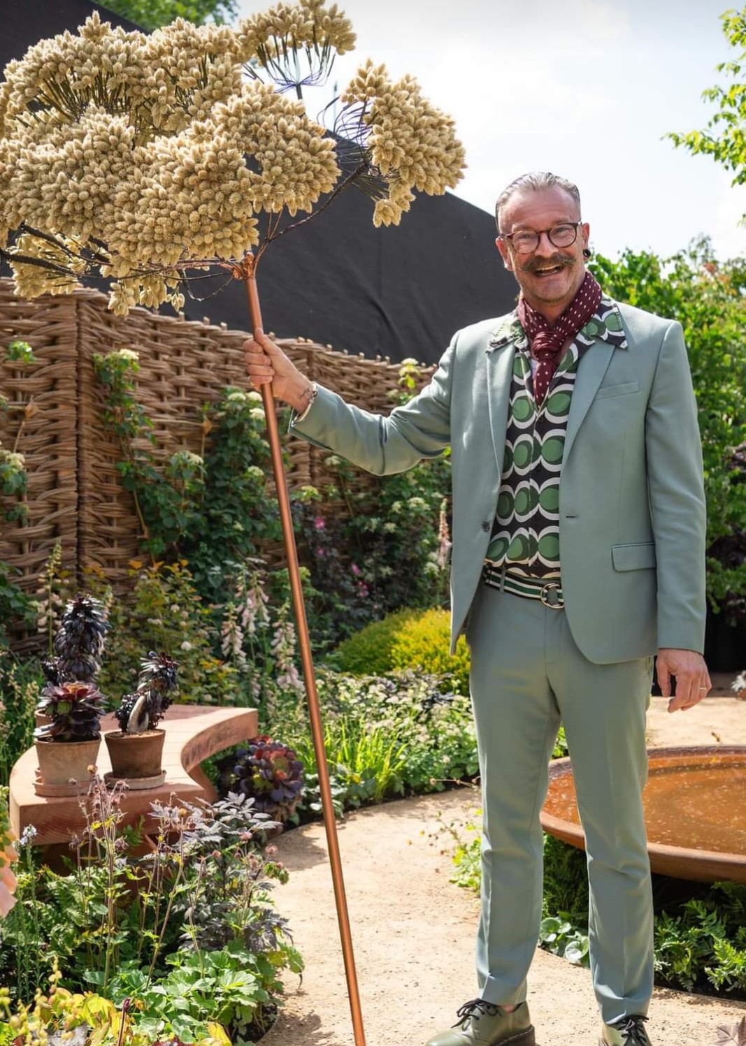 Simon Lycett stands alongside his Garden Umbrella